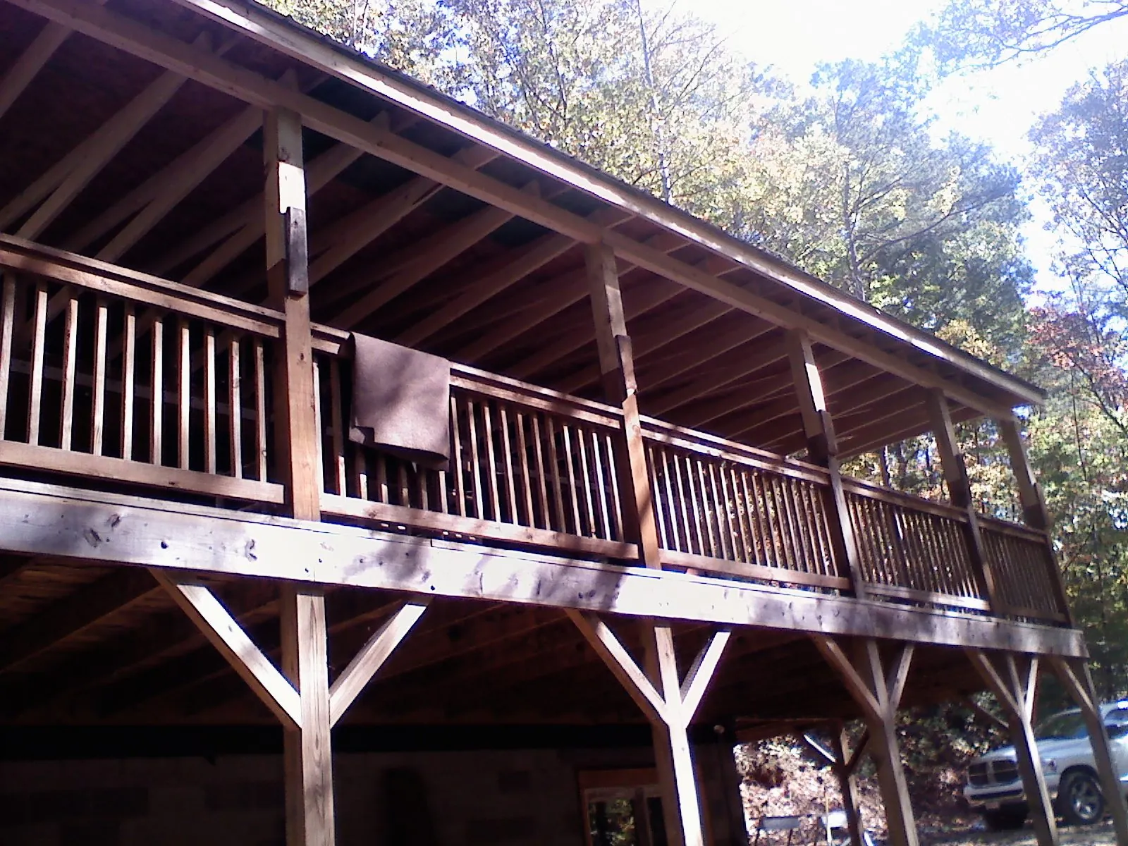 Timber framing under a new elevated porch and deck — Roof Leak Repair in Rumsey by Roofing Brothers